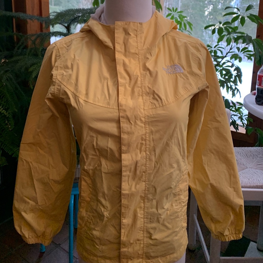 Light yellow North Face wind breaker